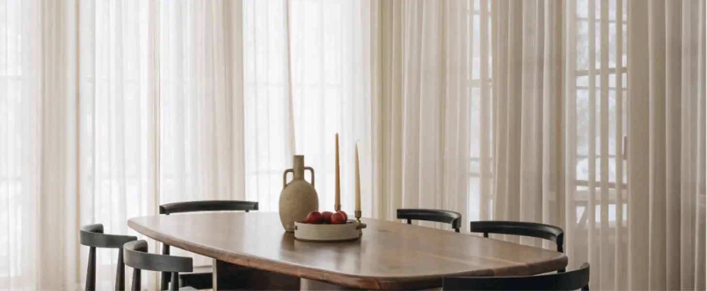 Sophisticated dining room featuring a handcrafted live edge table in Toronto with minimalist décor.