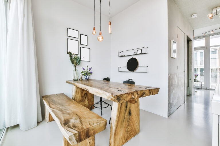 Handcrafted live edge dining table and bench in Toronto with natural wood finish.